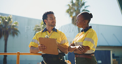 Buy stock photo Supply chain, coworkers outdoor and discussion with clipboard for quality control, dispatch or delivery. Logistics, people and talk in cargo zone with checklist for distribution, courier or planning.
