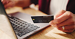 Hands, laptop and credit card for online shopping in home, easy payment and digital banking for bills. Person, computer and online transaction with ecommerce, fintech and retail discount at apartment