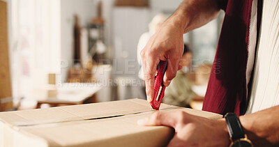 Buy stock photo Hands, knife and unboxing with logistics, startup and ecommerce with package at dropshipping company. Person, entrepreneur and boxcutter for tape, supply chain or check product at distribution center