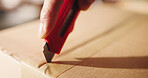Hands, boxcutter and dropshipping with stock, box or logistics for ecommerce at startup company. Person, entrepreneur and knife for storage, supply chain or closeup with tape at distribution center