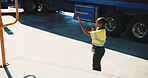 Logistics, radio and direction with black woman outdoor for supply chain, cargo courier and export. Distribution manager, transport coordinator and communication with person at warehouse for guide