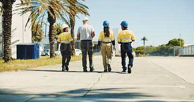 Buy stock photo Logistics, team and back with people outdoor for inventory management, delivery planning or export. Shipping schedule, distribution supervisor or collaboration with employees walking at warehouse