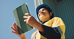 Logistics, outdoor or happy woman with tablet for inspection, supply chain or dispatch management. Low angle, transport service or manager with tech for delivery organization, distribution or safety