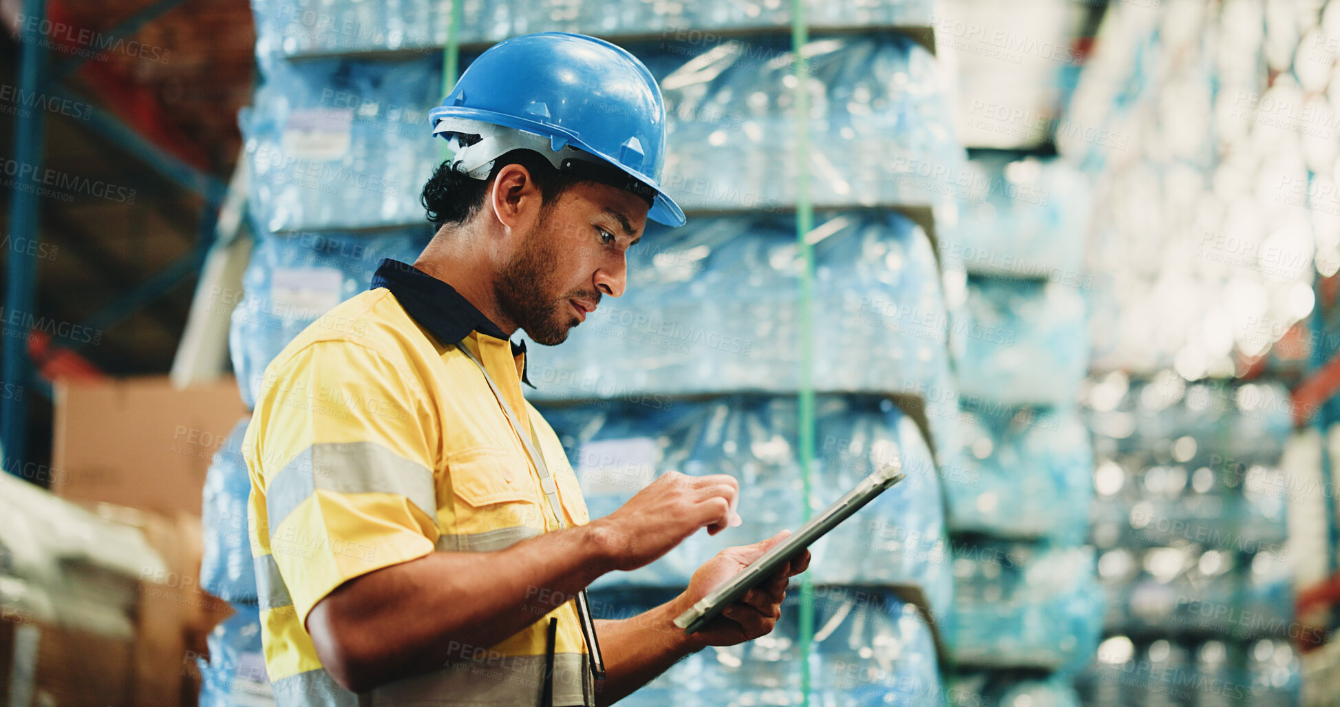 Buy stock photo Man, tablet and warehouse inspection for water distribution for disaster response with donation. Person, tech and profile with app, logistics or supply chain with aid for war relief at storage plant