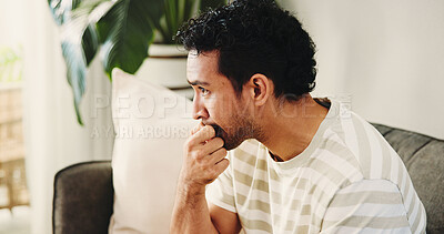 Buy stock photo House, biting nails and man on sofa, nervous and stress with mental health, thinking and bad habit. Frustrated, anxiety and Asian person with pressure, worry and concerned with coping mechanisms
