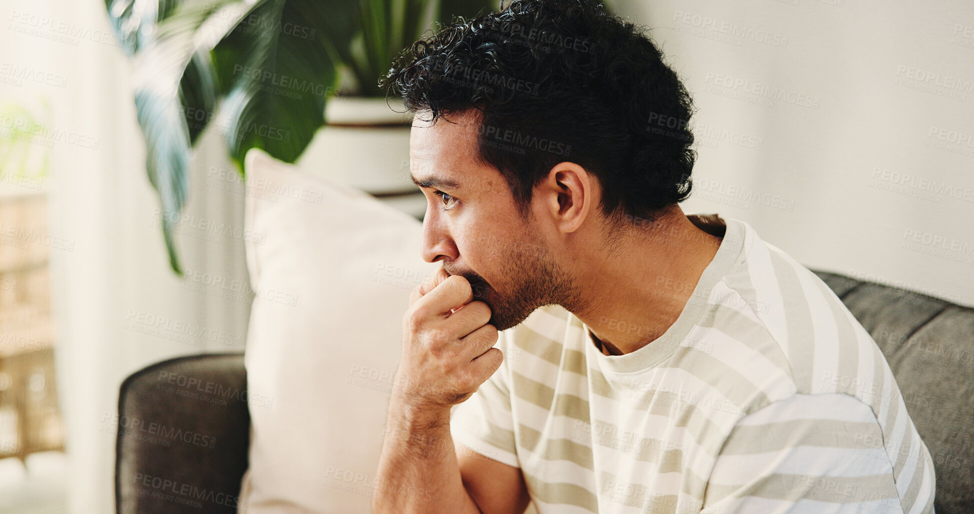 Buy stock photo House, biting nails and man on sofa, nervous and stress with mental health, thinking and bad habit. Frustrated, anxiety and Asian person with pressure, worry and concerned with coping mechanisms