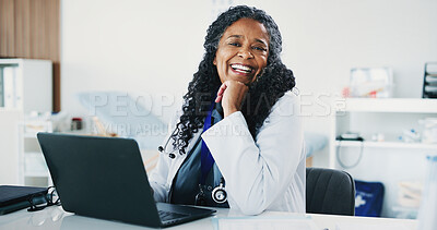 Buy stock photo Smile, mature woman and portrait of doctor with laptop for medical, healthcare or admin in office. Cardiologist, black person and tech with clinic schedule, telehealth or research for service