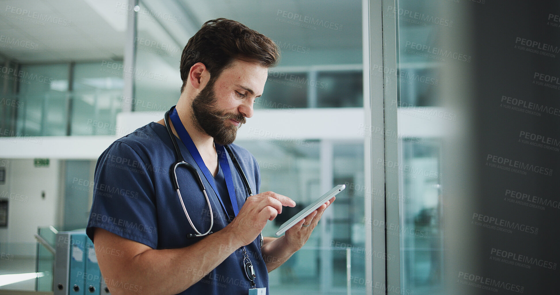 Buy stock photo Medical, smile or man in clinic with tablet, agenda check or patient review in online consulting. Healthcare, digital or doctor in hospital with tech, telehealth or surgery schedule in treatment plan