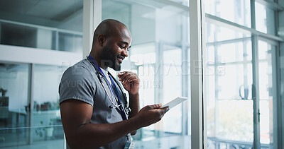 Buy stock photo Tablet, black man and doctor in hospital with research for medical service or surgery schedule. Telehealth, digital technology and African male healthcare worker with patient information in clinic.