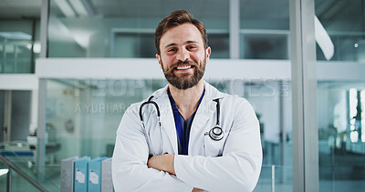 Buy stock photo Smile, crossed arms and portrait of doctor in hospital with confidence for healthcare career. Happy, medical service and male surgeon with pride for support or expert help in lobby at clinic.
