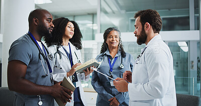 Buy stock photo Doctors, talking or people with notes in clinic, medical case review or consulting for treatment advice. Healthcare, teamwork or group with patient history info for diagnosis referral, help or report