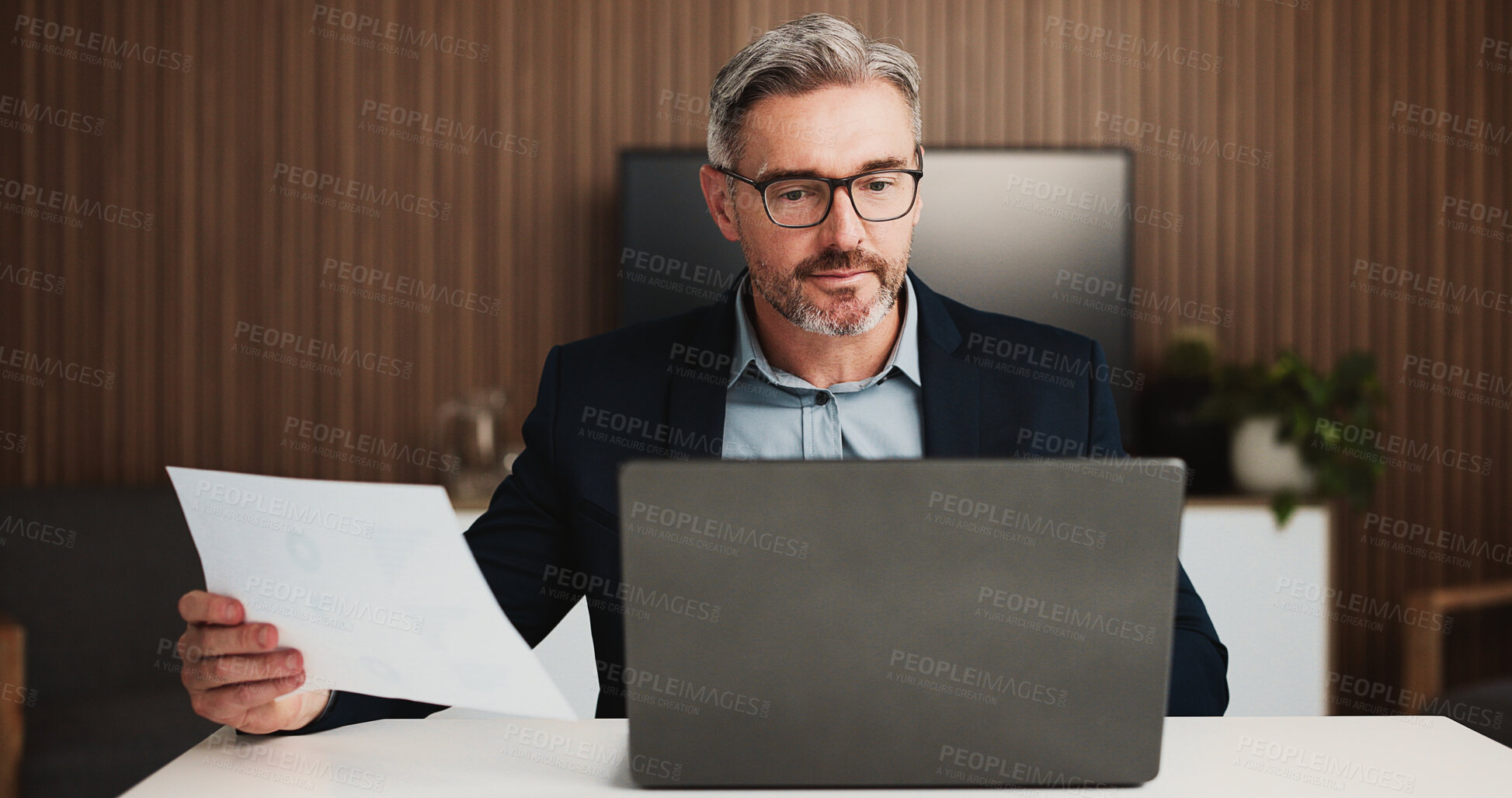 Buy stock photo Mature businessman, accountant or documents with laptop for finance report or expenses in office. Man, accounting or analyst with computer or paperwork for financial planning, budget or revenue