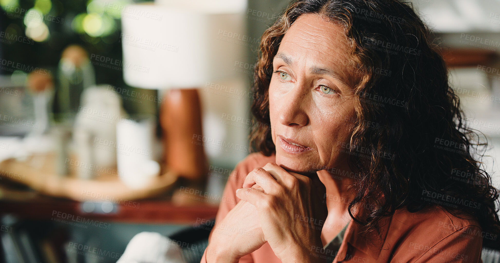 Buy stock photo Reflection, nostalgia and mature woman in house with  thoughts, past memory and sadness in living room. Mindset, space or senior person in home with perspective, wondering and loss in flashback.