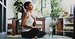 Meditation, breathing and zen with woman in home for spiritual balance, holistic and mindfulness. Wellness, chakra and yoga with person in living room of apartment for fitness, peace and health
