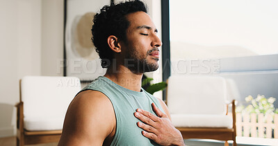 Buy stock photo Mindfulness, calm man or home for breathing routine, relaxation or body awareness practice for wellness. Meditation, inner peace or person in lounge for breathwork exercise, yoga or mental health zen