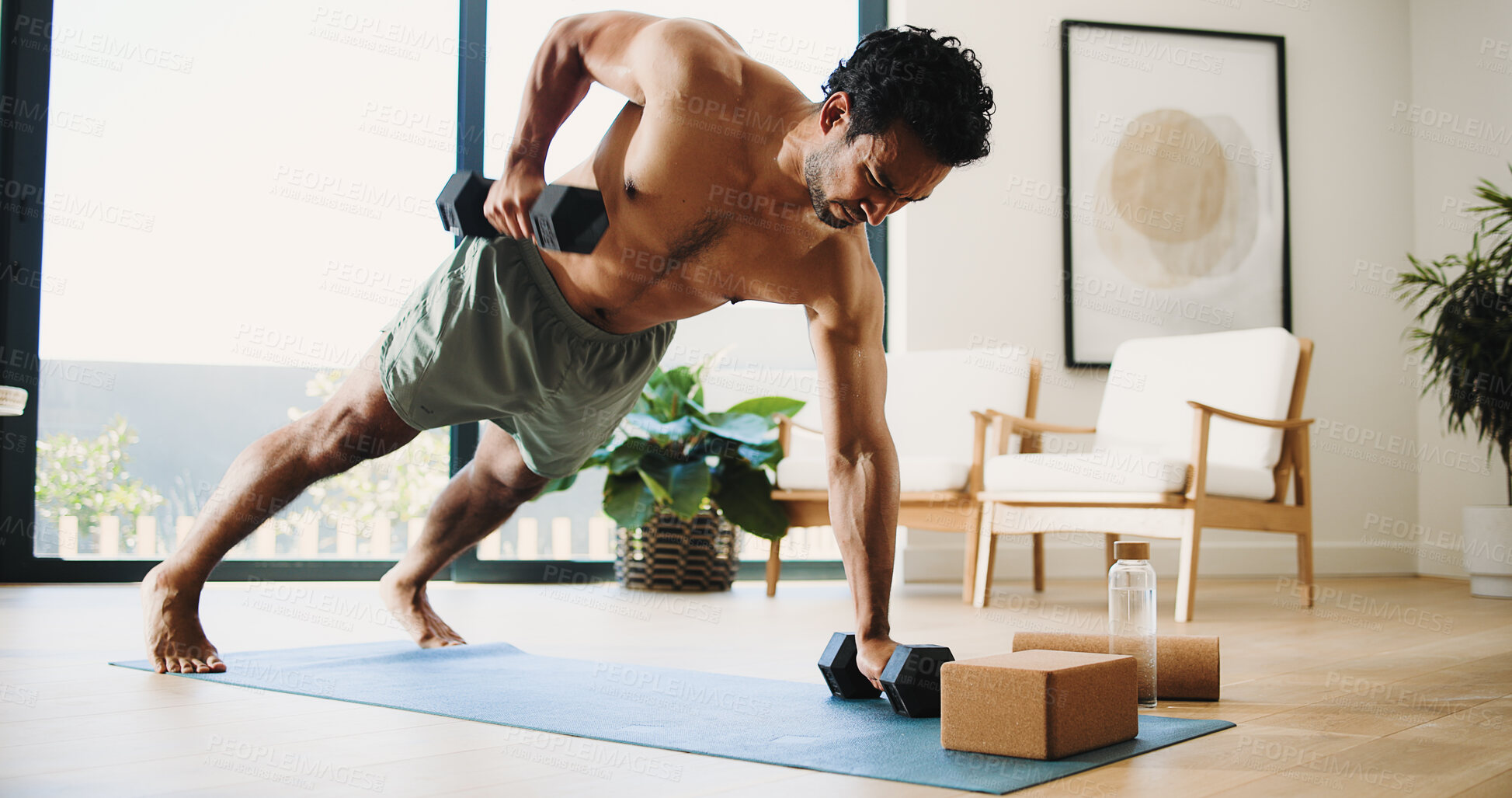 Buy stock photo Fitness, man and plank in home with dumbbells for balance exercise, strength training and bodybuilding. Active, person and weights in apartment with strong core for stability, workout or performance.