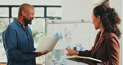 Buy stock photo Creative people, notebook and laptop with planning agency in office for finance or project management. Tech, meeting and graphs with man, woman and mentor in workplace for conversation or update