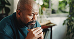 House, thinking and black man frustrated with nostalgia, decision and sad with mental health. Mature person, living room and regret with reflection, memory and doubt or disappointed in home lounge