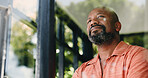 Relax, smile or black man at window with reflection, thinking or nostalgia on weekend rest. Happy, mindfulness or mature person in house with thoughts, positive memory or daydream on Sunday afternoon
