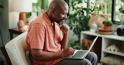 Buy stock photo Remote work, reading or black man in home with laptop, lead update or edit of article. Freelancer, mature person or journalist in living room with technology, fact check or source contact on email.