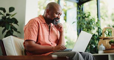 Buy stock photo Remote work, reading or journalist in house with laptop, lead update or edit of news article. Freelancer, mature person or black man in home with technology, fact check or source contact on email.