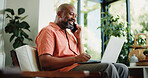 Man, talk and phone call in house with laptop for remote work, journalism and news report research. Mature black person, discussion and typing in home with computer, contact or freelance writing job.