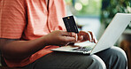 Man, hands and debit card in apartment with laptop, payment and discount promo for online shopping. Person, typing and fintech in house with computer, bank transaction and eft purchase for ecommerce.