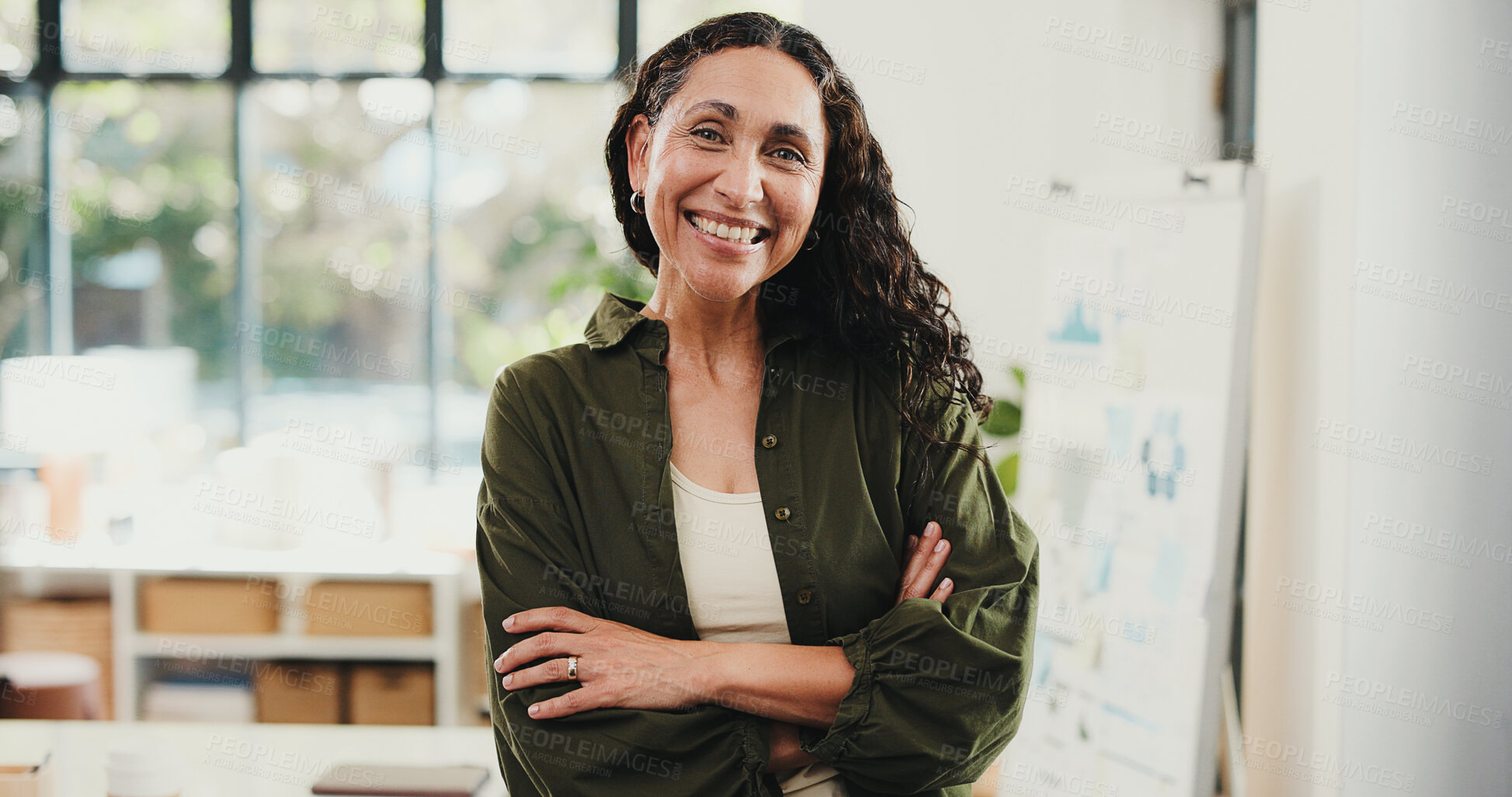 Buy stock photo Mature woman, portrait and confidence in home office for market research, remote work and about us. Creative consultant, freelancer and arms crossed for project management, pride or admin support