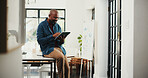 Black man, smile and tablet in home office for editing, remote work and business ideas. Virtual assistant, freelancer and tech for project management, creative agency or administration support