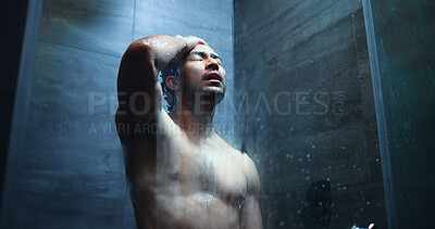 Buy stock photo Water, stress and man in bathroom with shower for mental health, grief or anxiety with body care. Person with depression, exhausted and low angle for upset, disappointment or morning routine in home