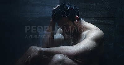Buy stock photo Man, shower and frustrated in bathroom for grief, mental health and reflection in home. Person with depression, house and running water for emotions, fear and disappointed with anxiety or stress