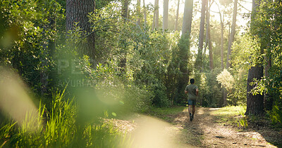 Buy stock photo Fitness, back and man in forest with running, cardio and stamina training in sport challenge. Exercise, wellness and athlete in nature with jog, outdoor trail and endurance workout in Costa Rica.