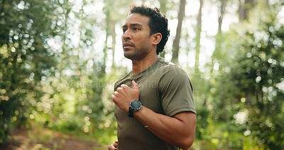 Buy stock photo Fitness, workout and man in nature with running, cardio and stamina training in sport challenge. Wellness, bokeh and athlete in forest with jog, outdoor trail and endurance exercise in Costa Rica.