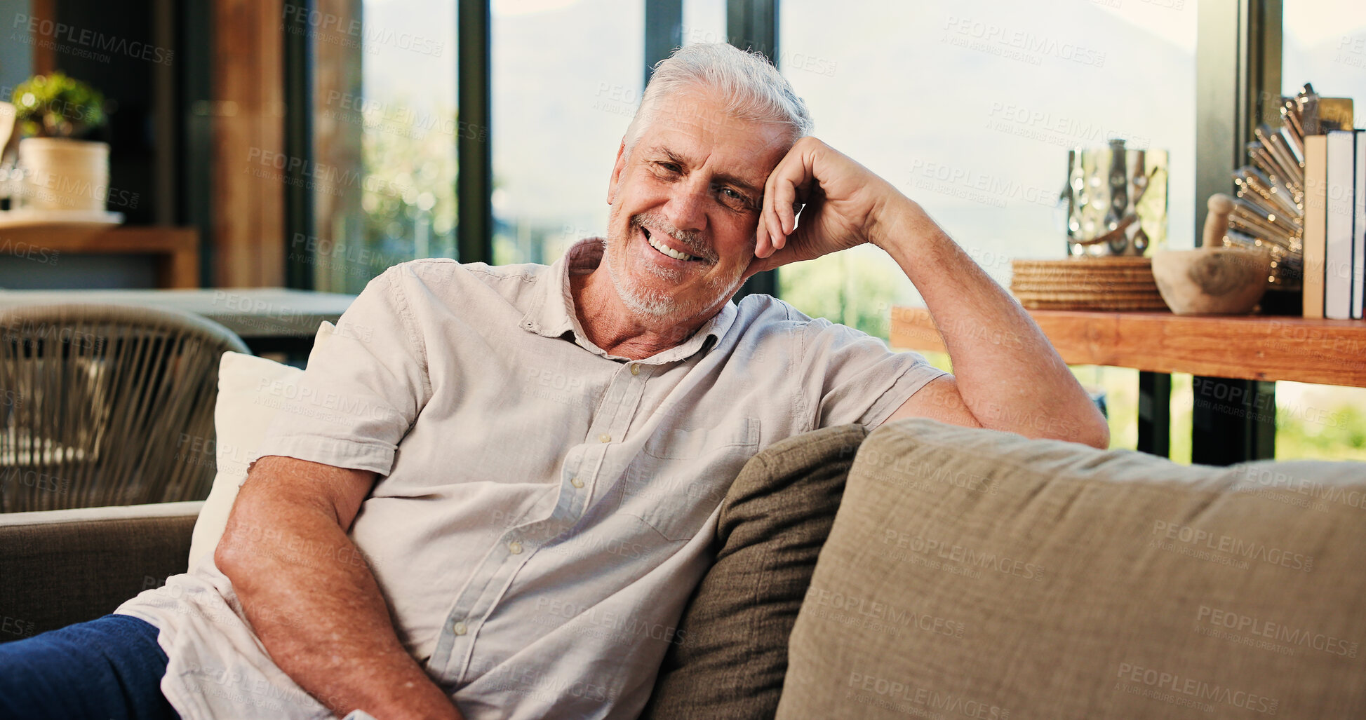 Buy stock photo Portrait, senior man and relax in home with smile, peace and calm morning on couch. Confident, elderly person and comfortable on sofa, weekend break and rest with happiness in lounge for retirement