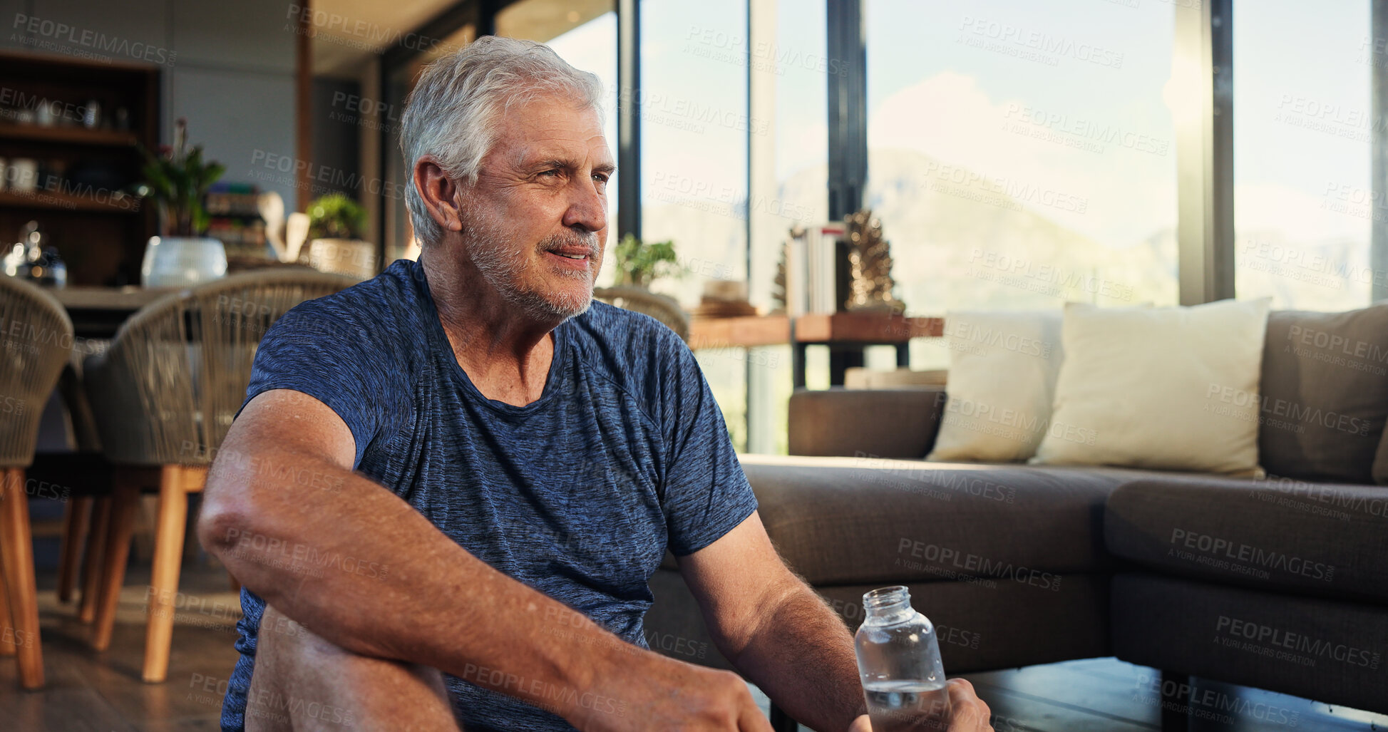Buy stock photo Home, yoga and old man with water bottle, thinking and relax with break, hydration and wellness. Apartment, pensioner or senior person with rest, thirsty and liquid with health, contemplation or calm