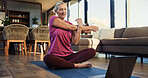 Laptop, stretching or senior woman in home with streaming, fitness or exercise activity video for wellness. Retirement health, yoga tutorial or elderly person with computer, watch online or mobility