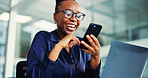 Phone, laptop and black woman in office laugh with comedy, communication or texting on mobile app. Cellphone, glasses and business person with message, ideas or social media on break in workplace