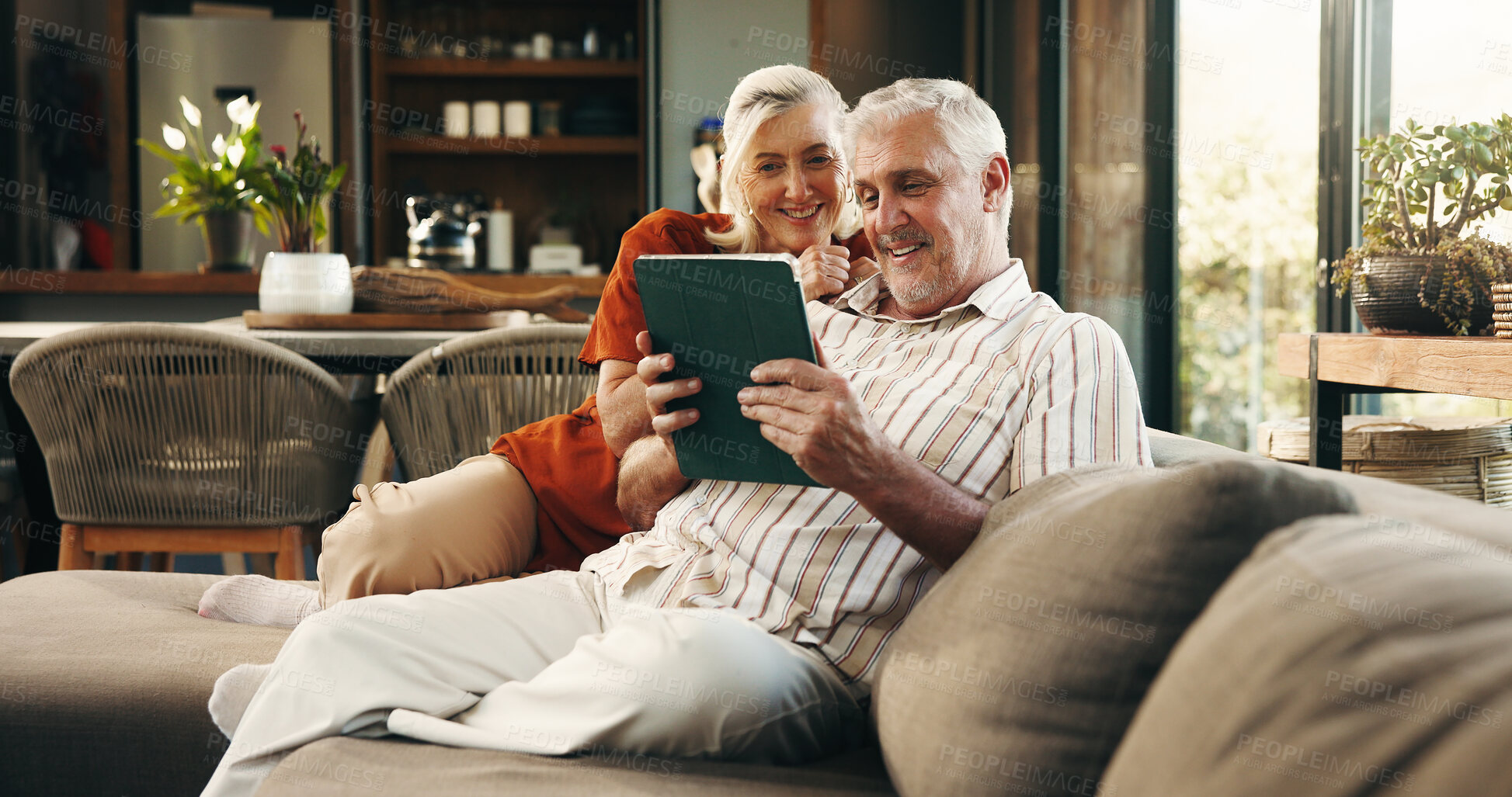 Buy stock photo Happy, tablet and senior couple on sofa for subscription, connection and online website in home. Retirement, marriage and old man and woman on digital tech for bonding, streaming and relax together
