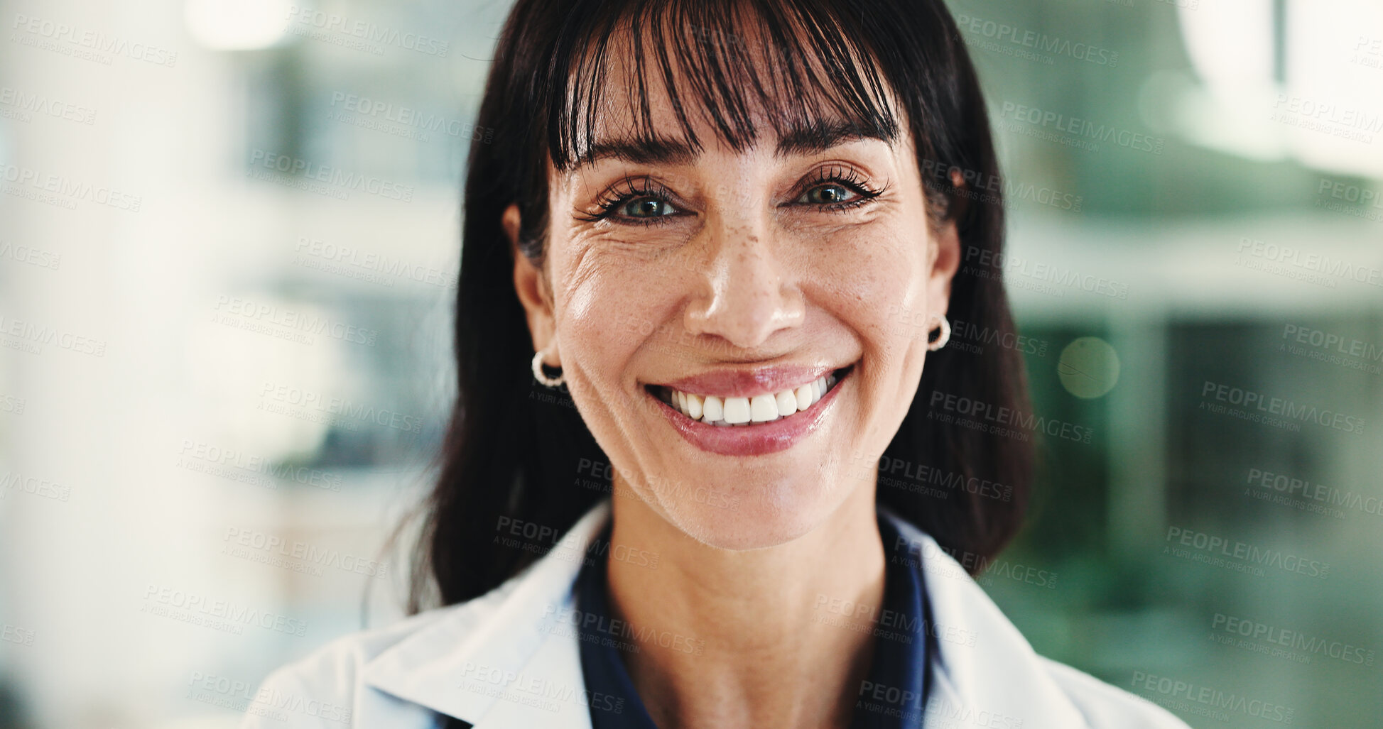 Buy stock photo Mature, doctor and portrait of woman in hospital lobby for healthcare advisor, about us and cardiologist. Medical professional, opportunity and heart physician with happy female person in clinic