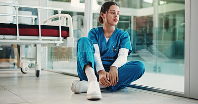 Buy stock photo Thinking, surgeon and woman in hospital, regret and unhappy for operation failure and mental health. Clinic, doctor and person with depression for loss, disappointed and reflection for medical error