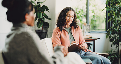 Buy stock photo Women, therapist and discussion in office, mental health and notebook for life coaching session. Listening, psychologist and client with trauma recovery, anxiety or person with depression and healing