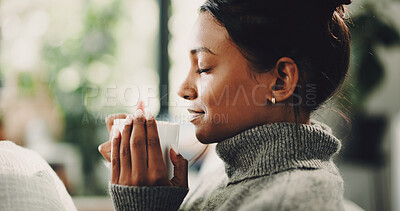 Buy stock photo Coffee, scent and woman on sofa in home with relax, peaceful and nostalgic morning in living room. Cappuccino, drinking and female person with warm beverage for smelling caffeine aroma in house.