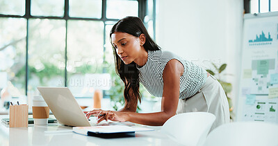 Buy stock photo Laptop, typing and business woman in office for financial review, statistics and budget report. Corporate, planning and person on computer with graphs, documents and research for finance analysis
