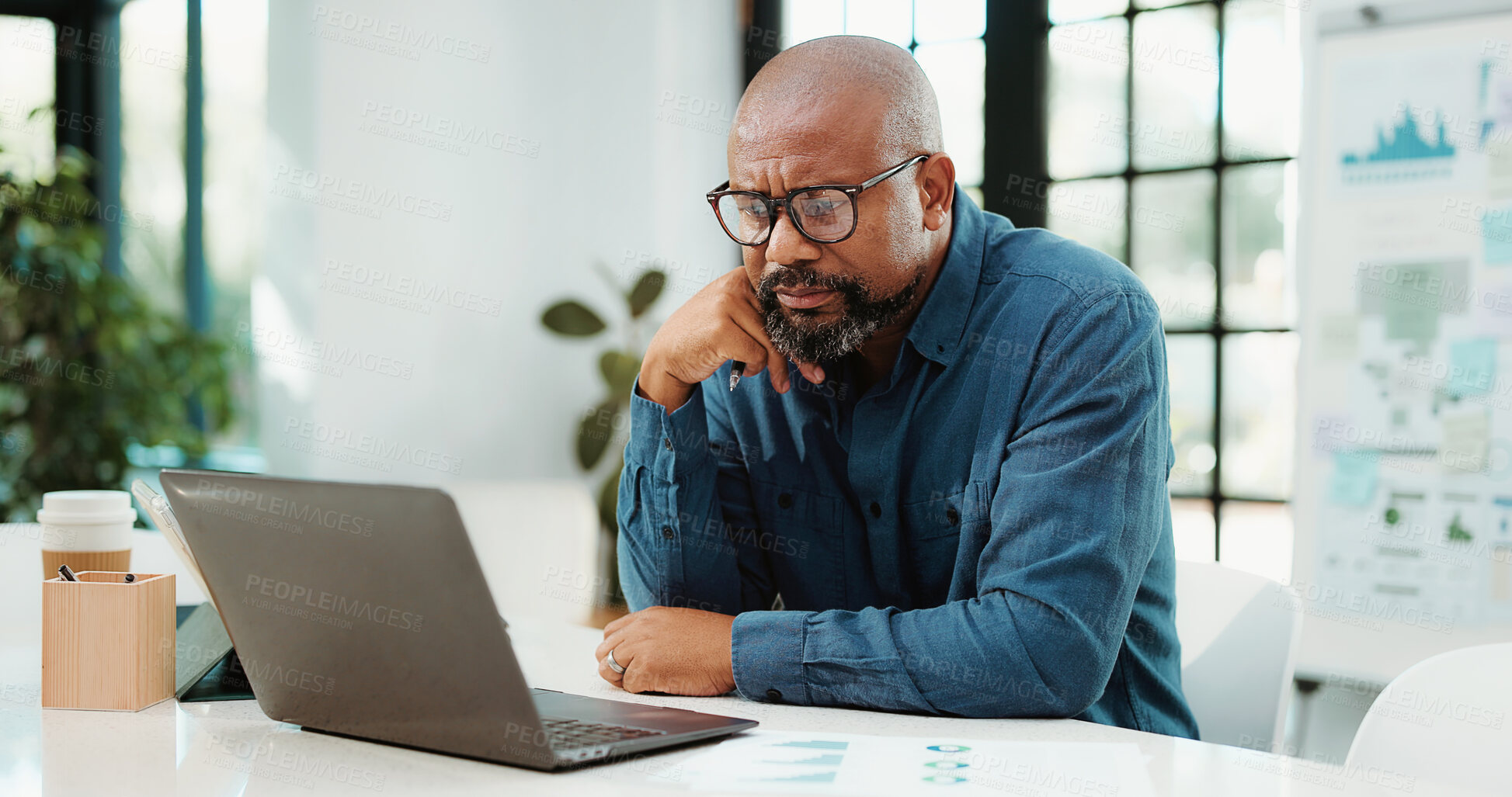 Buy stock photo Thinking, financial advisor and black man in office, laptop and research for trading portfolio. Mature person, decision and investor with pc, solution and email for profit growth, confused and choice