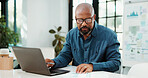 Laptop, office and business black man with graph for financial review, statistics or budget report. Corporate, planning and person on computer with chart, documents and research for finance analysis