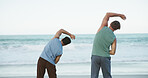 Personal trainer, outdoor and people stretching on beach, workout training practice and warm up routine. Fitness coach, back or men with bend exercise for mobility, posture or wellness support by sea