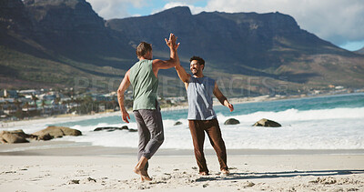Buy stock photo Yoga, class and men at beach with high five, teamwork and motivation in training support. Success, collaboration and instructor at ocean with session, guide and encouragement in holistic practice.