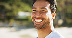 Ocean, portrait and man with smile, fitness and vacation with health benefits, excited and wellness. Seaside, runner and person with exercise, happiness and break for rest and holiday in Zanzibar