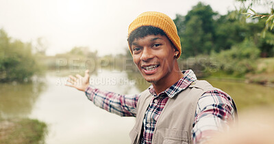 Buy stock photo Travel, vlog and portrait of man in nature for adventure, social media post and hiking explorer. Vacation photography, trekking vlogger and lake destination  with person outdoor for profile picture