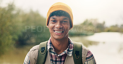 Buy stock photo Hiking, man and happy with portrait in nature for travel adventure, holiday activity and backpacker. Hiker, person and smile with backpack at lake for trekking break, eco friendly journey or vacation